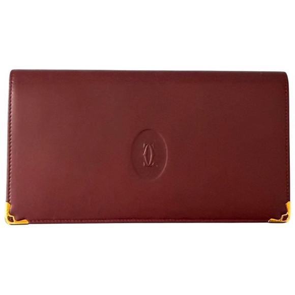 Cartier Long Leather Wallet- Burgendy with gold hardware and gold logo.